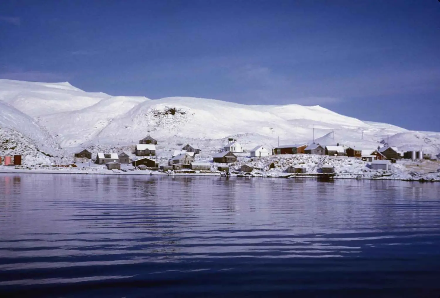 Scenic view from the water of a village on the island of Atka in the Aleutian islands