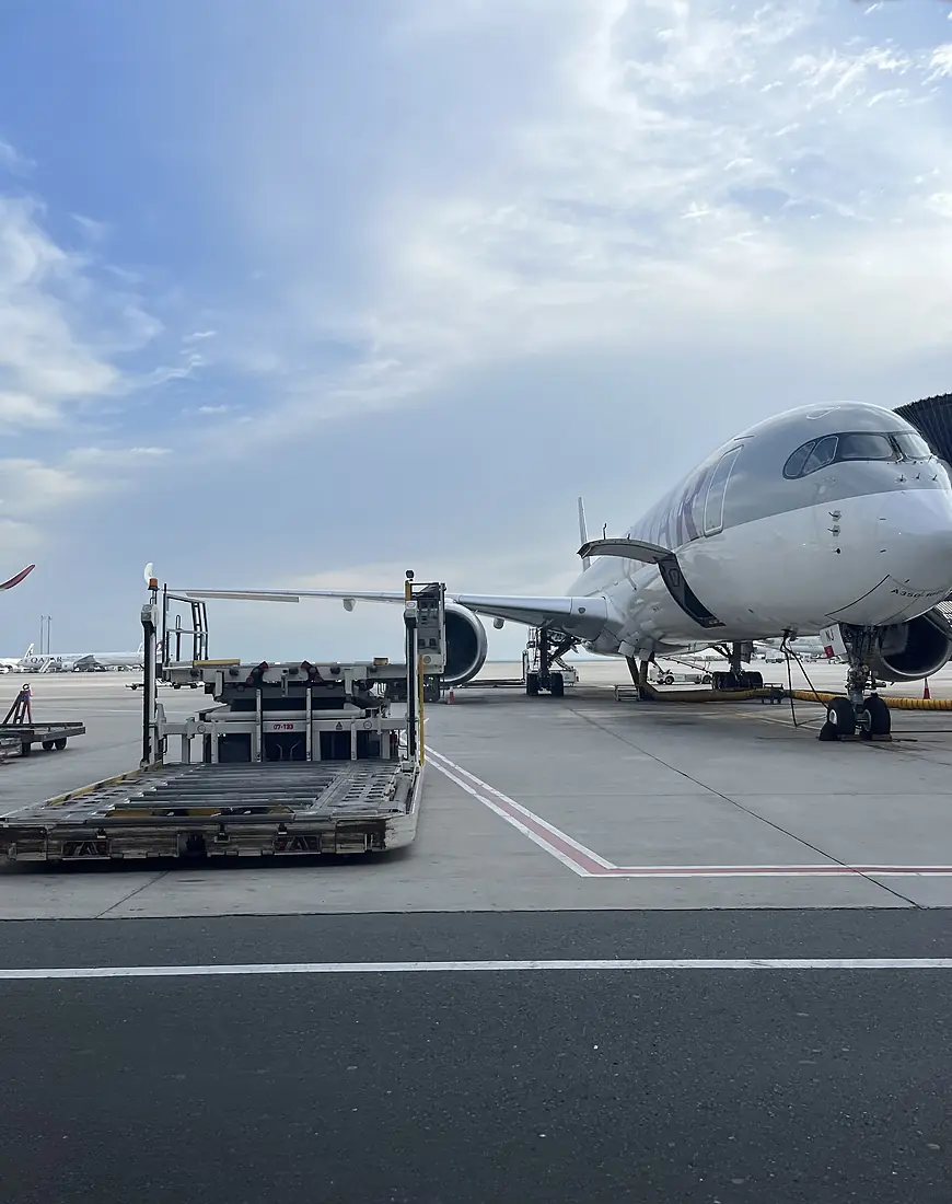 Qatar Airways aeroplane parking on ground in Doha 2024