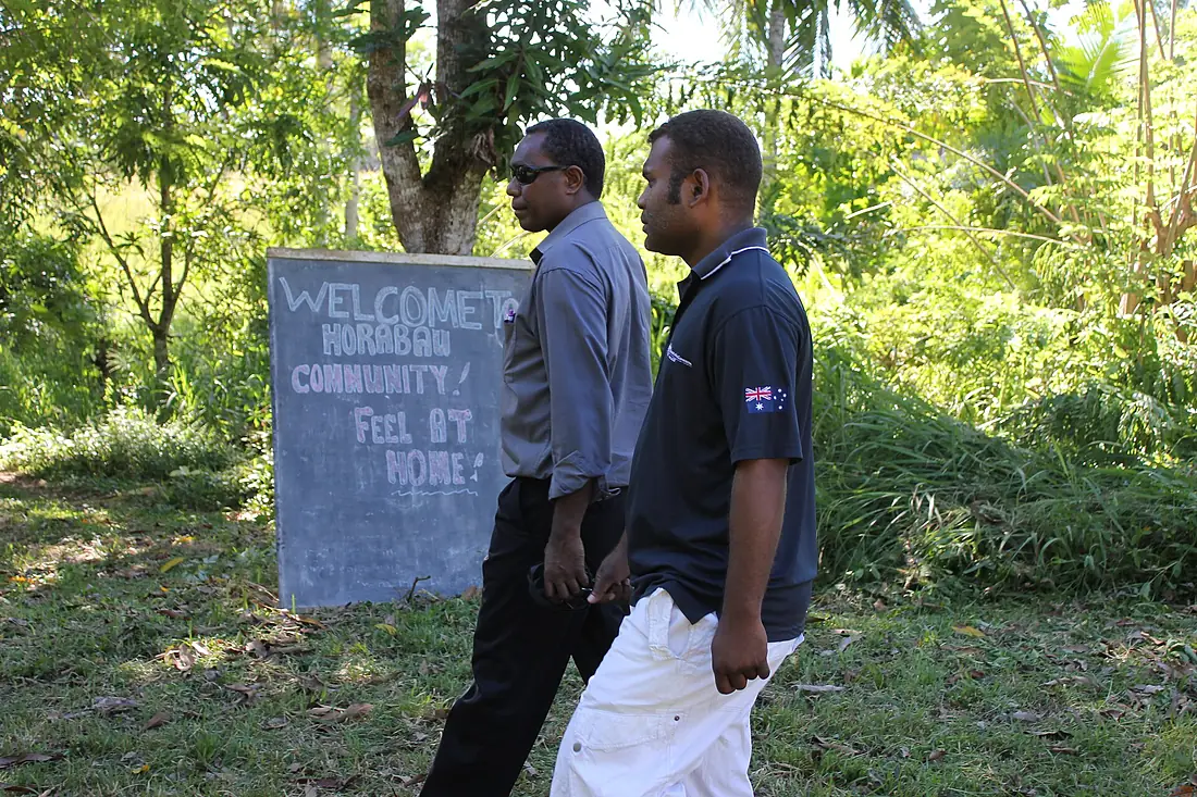 AusAID officer inspects the Horabau poultry project, Guadalcanal Province, Solomon Islands 2011. Photo- AusAID (10672432085)