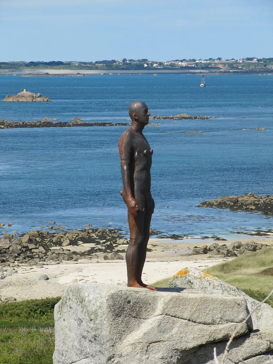 Antony Gormley's "Another Time XI" on Herm - facing right