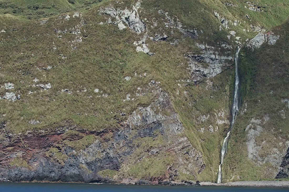 Inaccessible Island - waterfall over cliffs