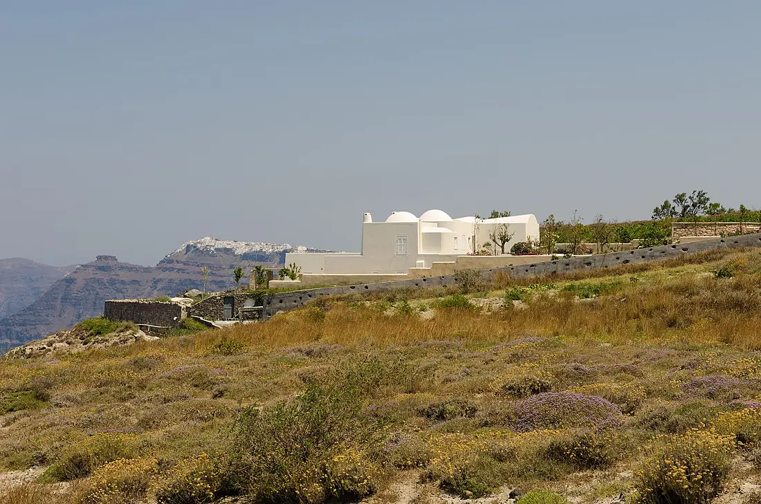 Building at the crater rim near Athinios port - Santorini - Greece