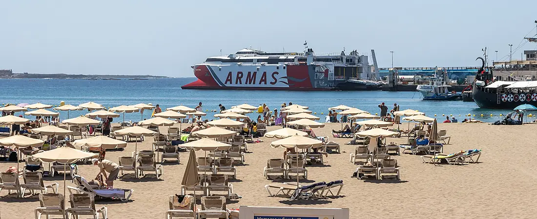 At Tenerife 2023 487 - Volcan de Teno and Ragnarok at the Port of Los Cristianos behind Playa Honda